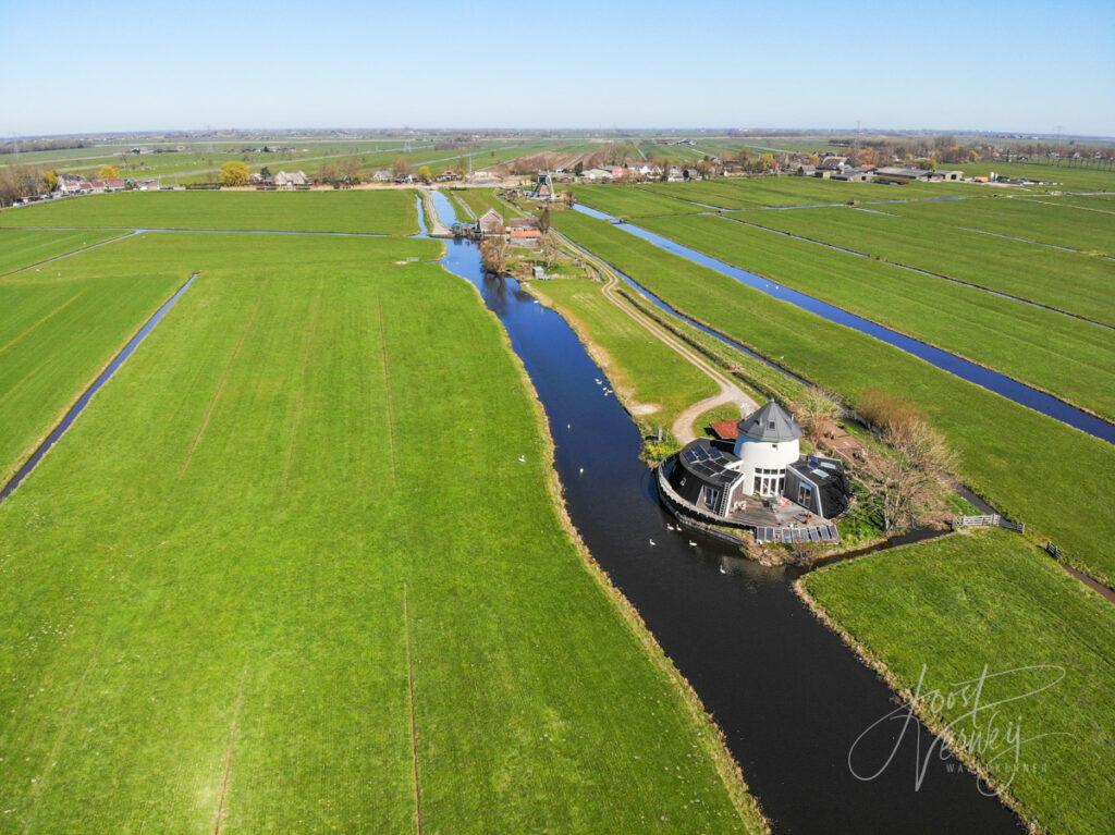 Luchtfoto Sliedrechtse binnenvliet met molenstomp, gemaal en molen